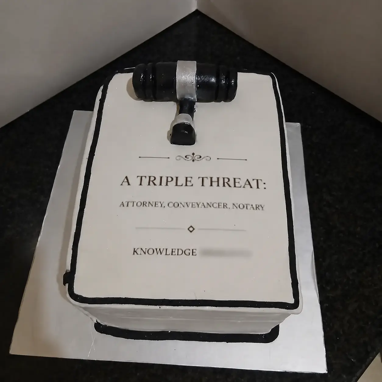 Law achievement cake with a gavel design by Simi's Cakes & More
