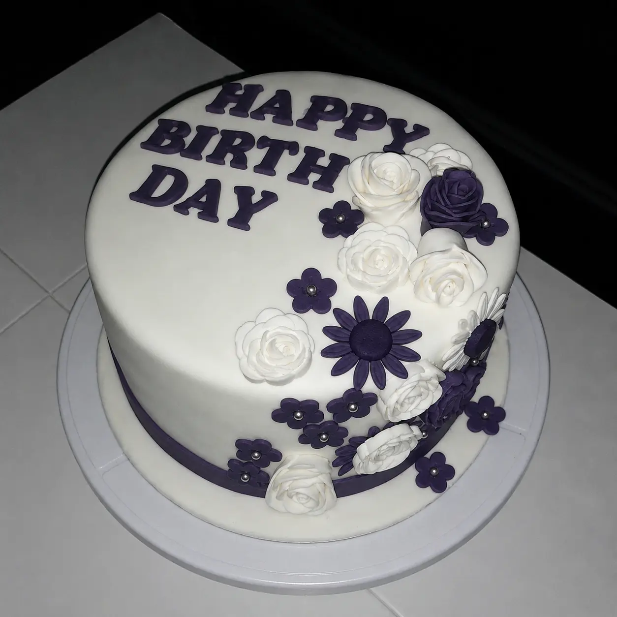 Purple Floral Birthday Cake by Simi's Cakes & More
